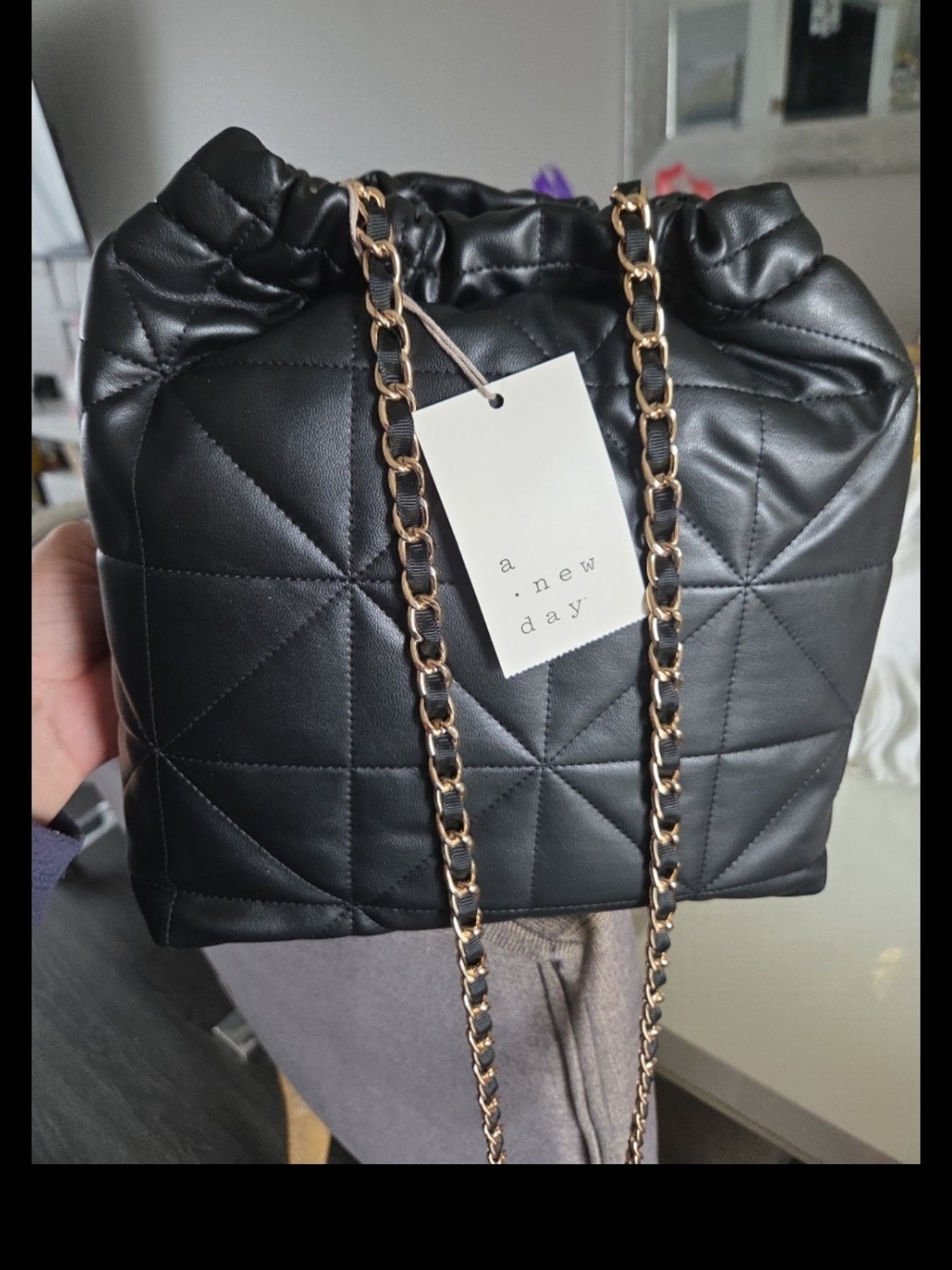 a new day Black Quilted Drawstring Crossbody with Gold Chain